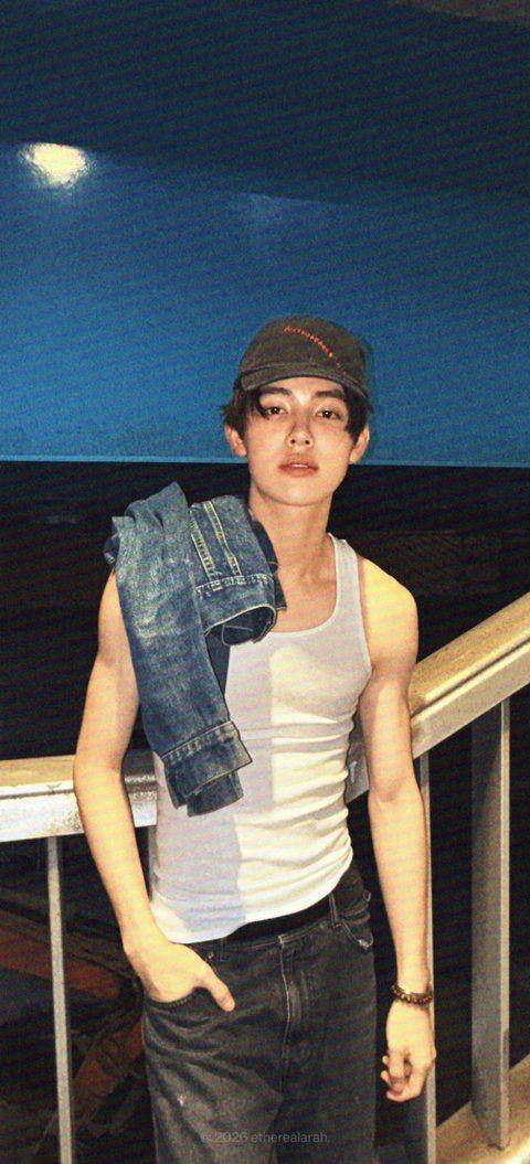 CORTIS Seonghyeon phone lock screen, white tank top and denim jacket at night